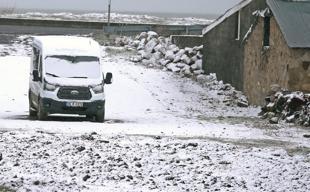Unseasonal snow hits east ahead of summer