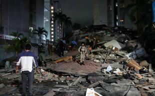 Venezuelans search for survivors after quakes kill at least 235