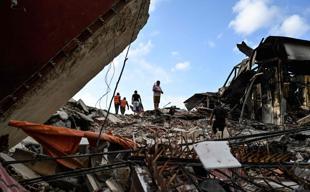 Venezuela quakes kill 1,400 as time running out to find survivors