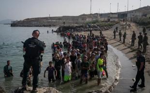 Spain installs floating barrier in Ceuta after deadly influx of migrants