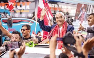 Former Nepalese PM Deuba returns home