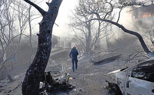 Fires near Athens controlled after claiming two lives