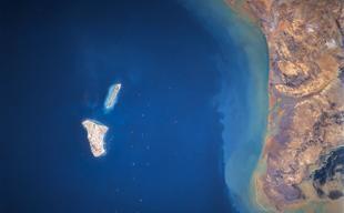 Iranian media report explosions near Kharg Island