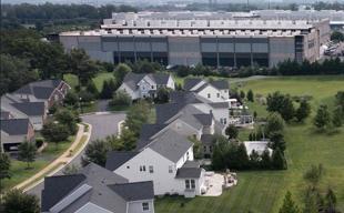 Amazon vows $1 billion for data center towns, decries myths