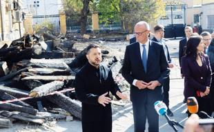 Russian strike hits Kyiv bridge as Merz visits