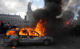 France pledges new curfews as PM seeks to regain control