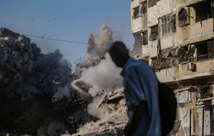 Gaza civil defense says Israeli attacks kill 13 including 5 children