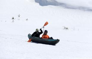 Kayakers glide over snow at Mount Erciyes in unusual winter experiment
