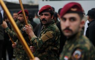 Iraq arrests four after rocket attacks on Syria base