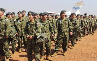 Japan aims to boost women troops as it struggles to enlist