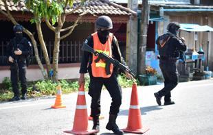 Dozens of attacks in Thailands restive south leave 2 injured