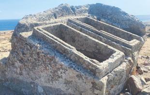 Twin sarcophagus carved into giant rock