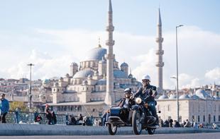 Tourists explore Istanbul streets on retro sidecar motorcycles