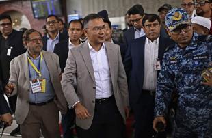 Prime minister hopeful Rahman arrives in Bangladesh