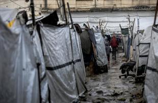 Winter rain floods Gaza camps amid calls for more aid