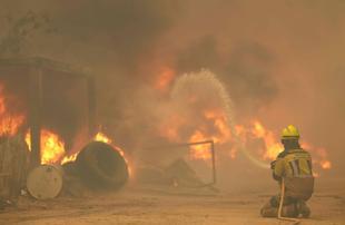 More than 200,000 flee out-of-control wildfires in France, Spain
