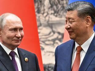Putin in trade push on final day of China trip