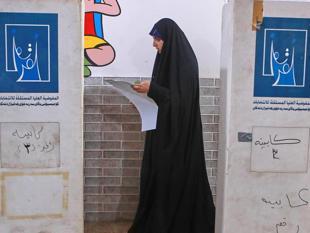 Iraqis vote in general election in rare moment of calm