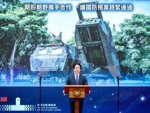 Taiwans president vows to defend sovereignty