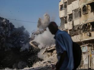 Gaza civil defense says Israeli attacks kill 13 including 5 children