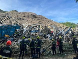 One dead, dozens missing after Philippine dump site collapse