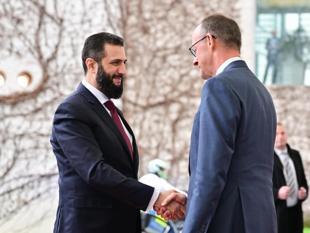 Syrian leader visits Germany to talk war, recovery, refugees