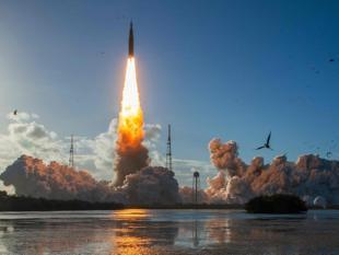 Astronauts begin NASA lunar mission after climactic blast-off