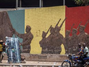 Mali junta in crisis after minister killed, key city captured
