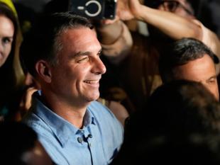 Brazil heads to run-off as Bolsonaro leads Lula