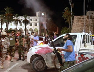 Libya fighters capture Gadhafis son