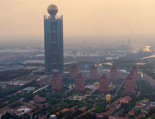 Chinas richest village opens skyscraper hotel