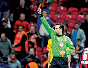 Turkish supporters show irritation for the ‘men in black’ again