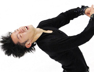 Takahashi triumphs at home despite fall