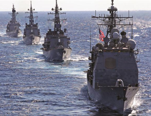 US flexes muscles at Beijing