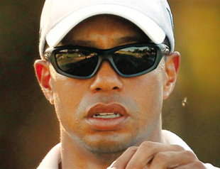 Revitalized Woods back in the hunt for trophy in Australia