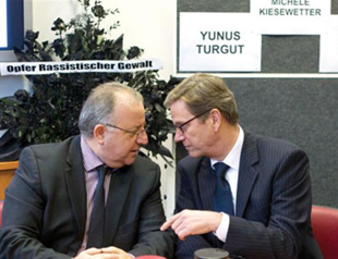 German FM vows justice after killings