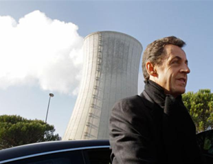 Sarkozy clings to nuclear energy amid protests