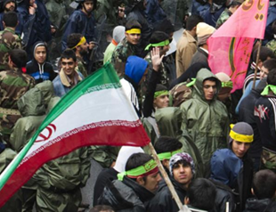Iran protesters enter British embassy compound, remove flag