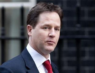 Britain seeks to calm economic war of words with France