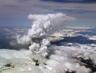 Ash cloud rises above restive Chilean volcano