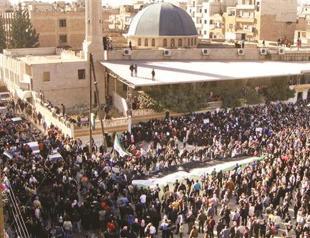 Davutoğlu urges Assad to commence dialogue