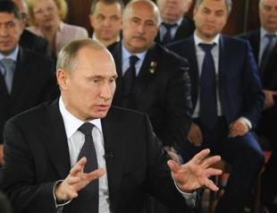 Putin says to reshuffle govt after presidential vote