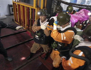 Four dead, 50 trapped in China mine accident