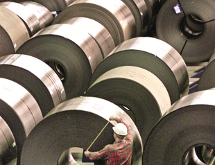 Merkel shifts view on minimum wage