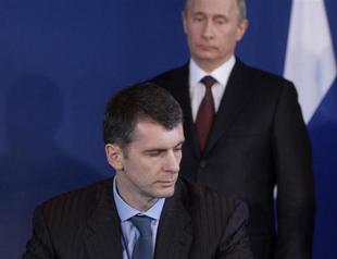 Putin’s new tycoon rival casts doubts