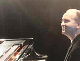 Turkish classical pianist on stage