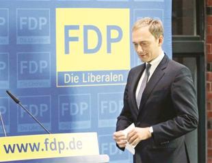 German politician quits amid rescue row