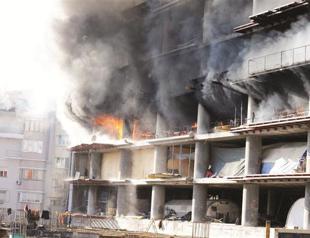 Fire destroys hotel contsruction area