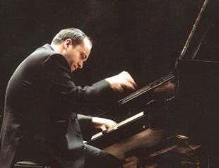 Jerfi Aji onstage for piano concert at Akbank Art