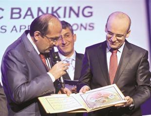 Minister praises Islamic model of banking as crisis repellent